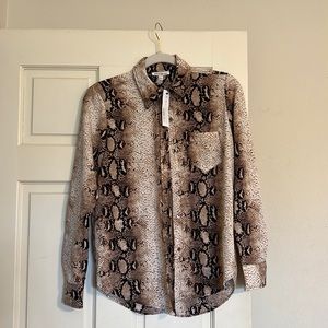 Never worn - has tag! Not my style, but would perfect for anyone into prints.